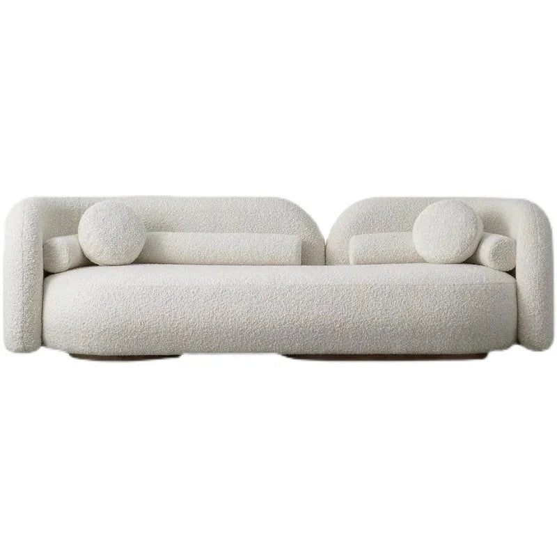 "Modern Curved Off-White Bouclé Sofa  with Round Accent Pillows"