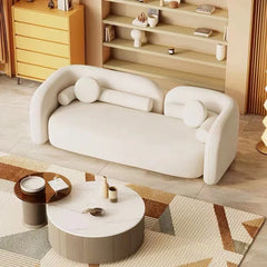 "Modern Curved Off-White Bouclé Sofa  with Round Accent Pillows"